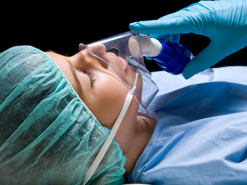 A woman being given general anesthesia before her surgery from Placentia Oral Surgery in Placentia, CA